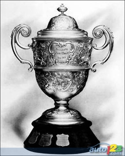 The Dewar Trophy is a 57cm high silver cup that was donated by Sir Thomas R. Dewar (1864-1930), a succesful Scottish whisky distiller and member of parliament of the United Kingdom.