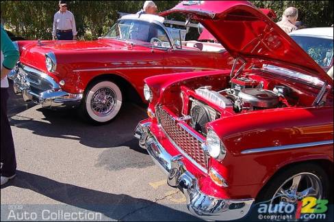 A symphony in red: a 1955 Chevrolet Bel Air ($41,800) and a 1957 Buick Roadmaster convertible ($75,250) at RM Auctions.
