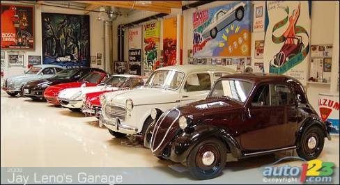 With a tiny 13.5-horsepower, 500-cc, twin-cylinder engine, this 1937 Fiat 500 "Topolino" is undoubtedly the least potent car in the entire garage. On the right is a 1959 Fiat 1100 sedan, followed by a NSU Prinz, three Mazdas and a Saab.