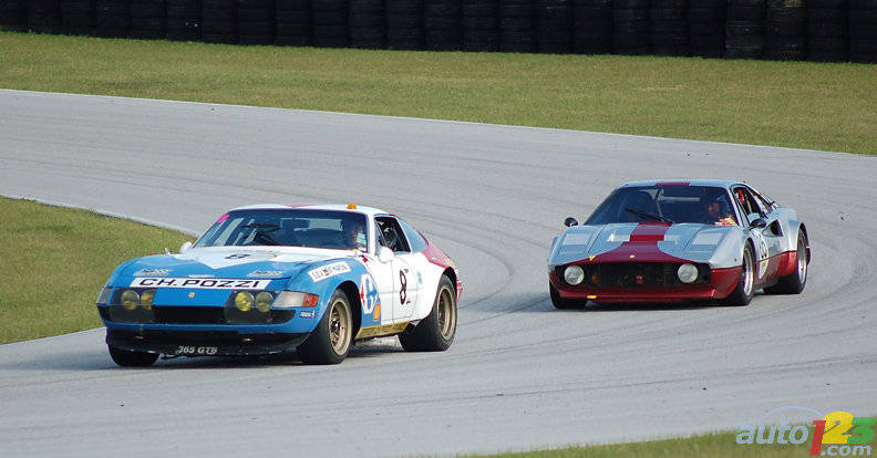 The powerful 1972 365 GTB/4 C is hounded by the very agile 1977 308 GTB/M Gr 4 at the Palm Beach International Raceway.