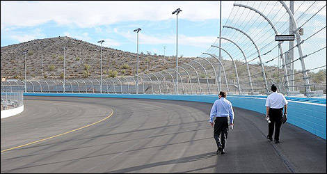 Robin Pemberton and Dave Handy walk the new backstretch at Phoenix International Raceway. (Photo: nascar.com)