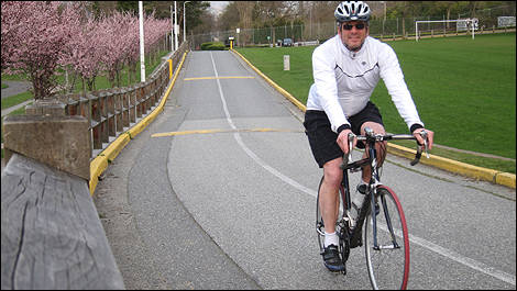 Rob Rothwell on a bicycle