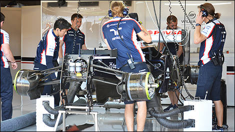 The Williams team at work in the garages.