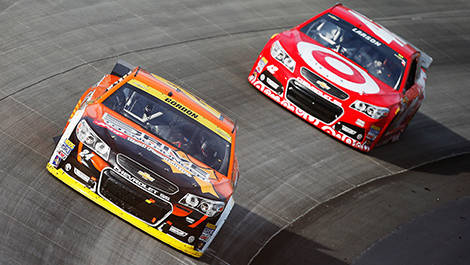 Jeff Gordon fighting against Kyle Larson.