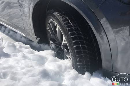 A Michelin tire in the deep snow