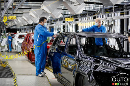 Workers in the Spring Hill plant