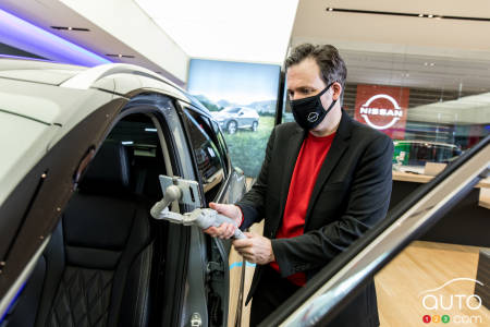 Representative with camera in the Nissan Studio