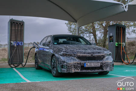 BMW i5 at charging station