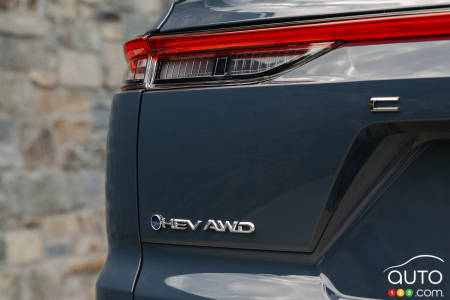 Teaser image of future hybird-midsize SUV from Toyota