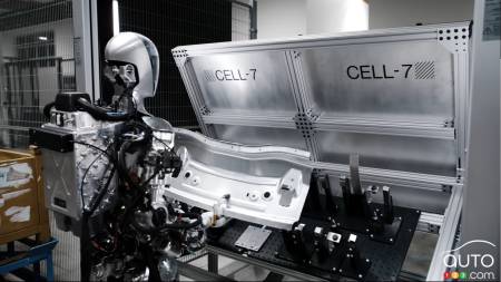 A humanoid robot in testing at a BMW plant