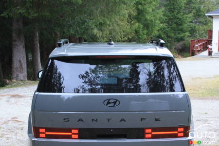 Glimpse of 2024 Hyundai Santa Fe from rear