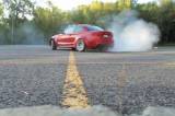 Video of the 2011 BMW 1M Coupe doing doughnuts