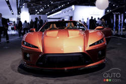 It's mean, it's extremely powerful and it's made in America. The Falcon Motors F7 is a mid-engine supercar that boasts a carbon fibre body built on an aluminum and carbon fibre monocoque chassis.

The F7 is equipped with a Chevrolet sourced 7.0L V8 that produces 620 hp and 585 lb-ft of torque as well as a 6-speed manual gearbox. According to Falcon Motors, the car weighs in at 2,785 lbs and can reach 200 mph. The car shown in this video is the first production example of the F7.