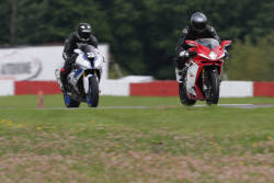 An Italian, a German, a ton of electronics and a race track, all you need to satisfy the most demanding rider. Moto123.com has tested two of the most powerful and technologically advanced 4-cylinder superbikes to date; the MV Agusta F4RR and the BMW HP4 Competition.