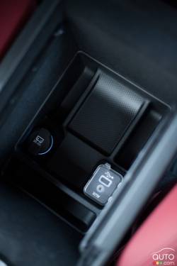 Power outlet, auxiliary input jack and USB port in the centre console
