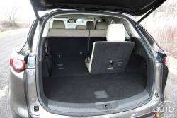 Rear trunk with folding seat