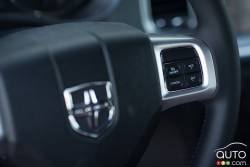 Steering wheel-mounted cruise controls