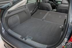 Rear trunk with folding rear seat