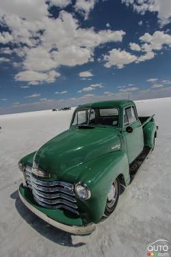 A classic Chevy truck waits for the race crew to return from the finish line.