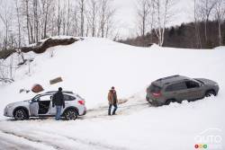 Subaru Crosstrek pulling Jeep Renegade out from snow