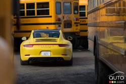 Full rear view next to a schoolbus
