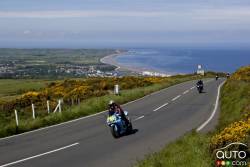 Bikers ride the TT course before qualifying for the race on the Isle of Man