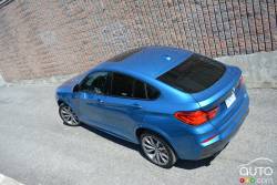 2016 BMW X4 M4.0i rear 3/4 view