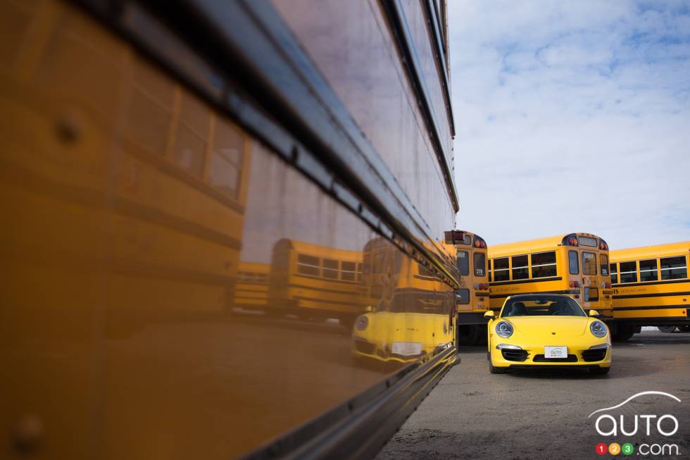 Front view, away next to a schoolbus