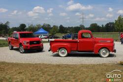 Two generations of Ford trucks