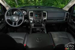 2015 Ram 1500 Black Sport 4x4 front interior compartment