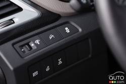 Hill descent control, stability and traction control and heated steering wheel buttons