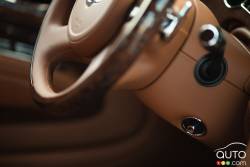 Steering wheel adjustment control