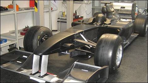 F1 Team Lotus Unveils Wind Tunnel Model Car Photos Car News Auto123