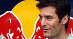 F1: Mark Webber shakes hands with Heikki Kovalainen after crash