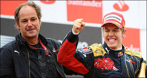 Gerhard Berger and Sebastian Vettel on the podium at Monza 2008