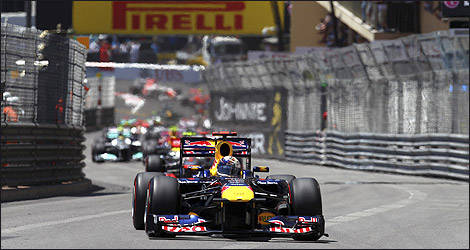 Sebastian Vettel leading in the streets of Monaco - Photo: Pirelli