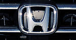 Honda to cut Japanese exports by half