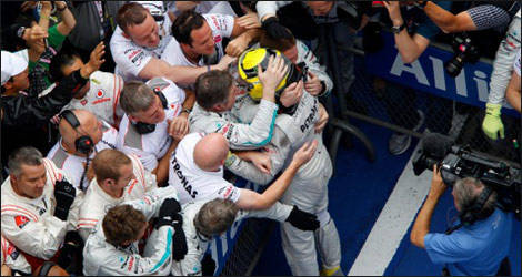 A delighted Nico Rosberg shares his joy with Mercedes mechanics (Photo: Mercedes-AMG-F1.com)