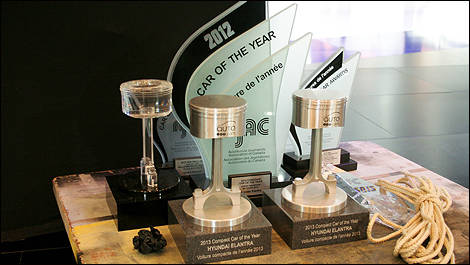 Auto123 Awards trophies at Hyundai booth during set-up 