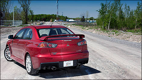 2012 Mitsubishi Lancer Evolution rear 3/4 view