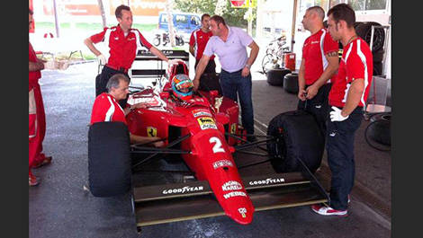 Andrea Bertolini in Nigel Mansell's Ferrari F1-90. 