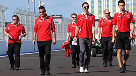 Alexander Rossi and the members of the Marussia team in Soshi. 