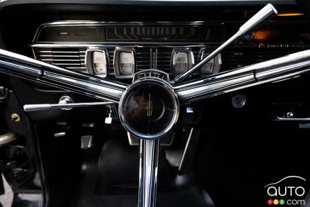 Glimpse of 1965 Lincoln Continental from interior