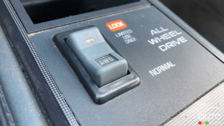 The 1990 Pontiac 6000, button for AWD system