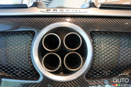 The four central exhaust tailpipes, typical of the Pagani design.