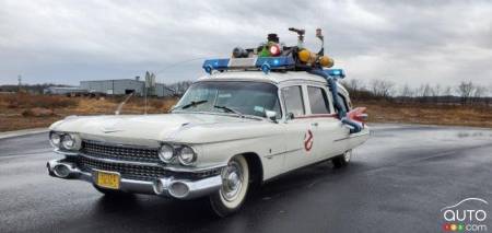 The replica of the Ghostbusters hearse, a 1959 Cadillac, three-quarters front