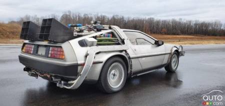 The replica of Doc's DeLorean, three-quarters rear