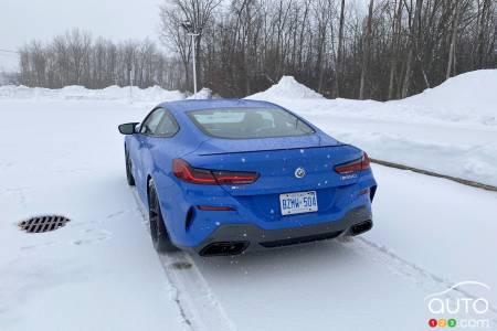 2023 BMW M850 on road in winter
