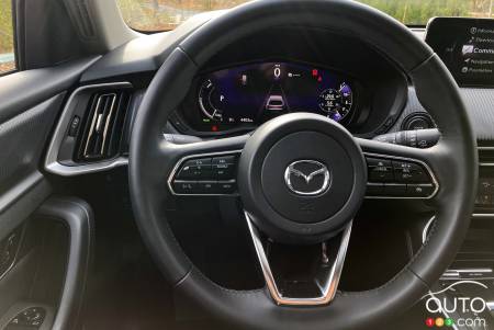 Steering wheel, data screen in the 2024 Mazda CX-90 PHEV