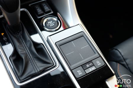 Lower console of a vehicle interior in the sun